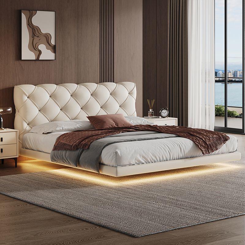 Floating Lighting Bed Frame with Tufted Headboard.