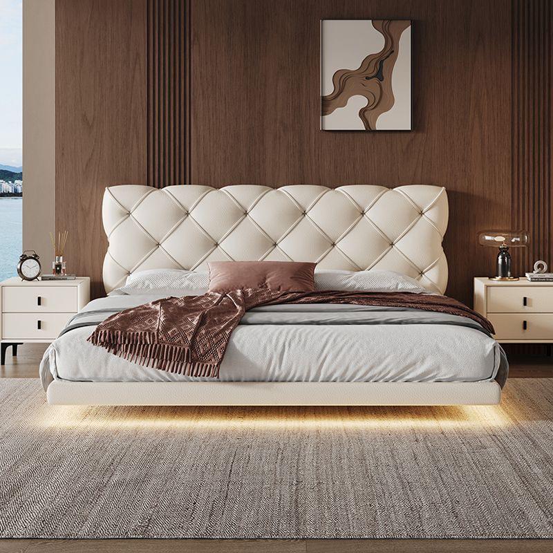 Floating Lighting Bed Frame with Tufted Headboard.