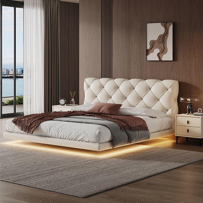 Floating Lighting Bed Frame with Tufted Headboard.